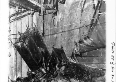cabinet upside down in rubble pile inside USS Liberty