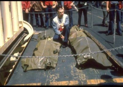 Four body bags containing USS Liberty crewmen killed in the 1967 Israeli attack