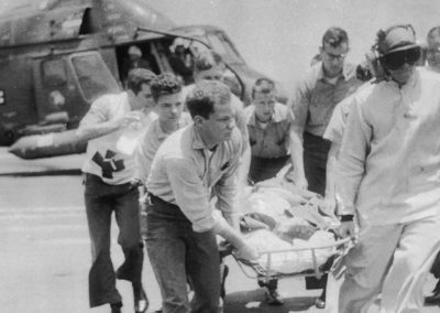 Injured USS Liberty crewman being carried on stretcher